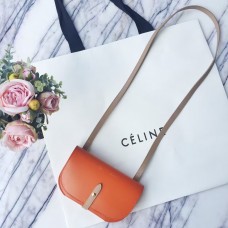 Celine kabelka s oranžovým popruhem a palmelato střihem Celine kabelka s oranžovým popruhem a palmelato střihem