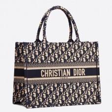 Malá plátěná taška Dior s knižní výplní z modrého šikmého plátna