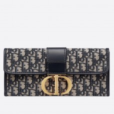 Kabelka Dior 30 Montaigne Clutch v modrém šikmém plátně